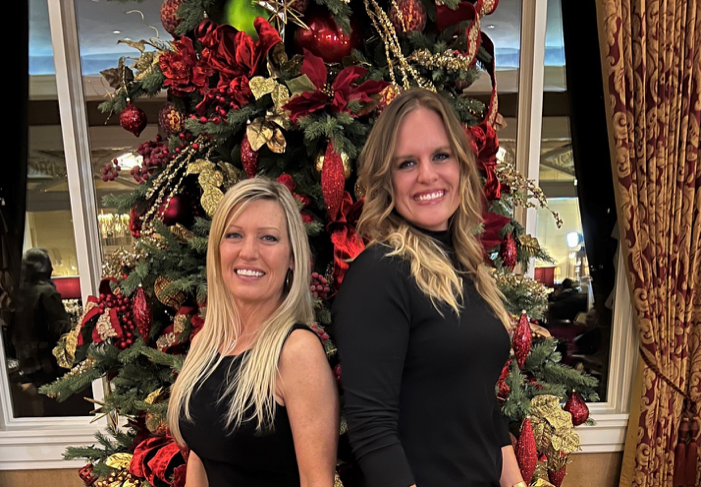Rocky Mountain Girls in front of a christmas tree